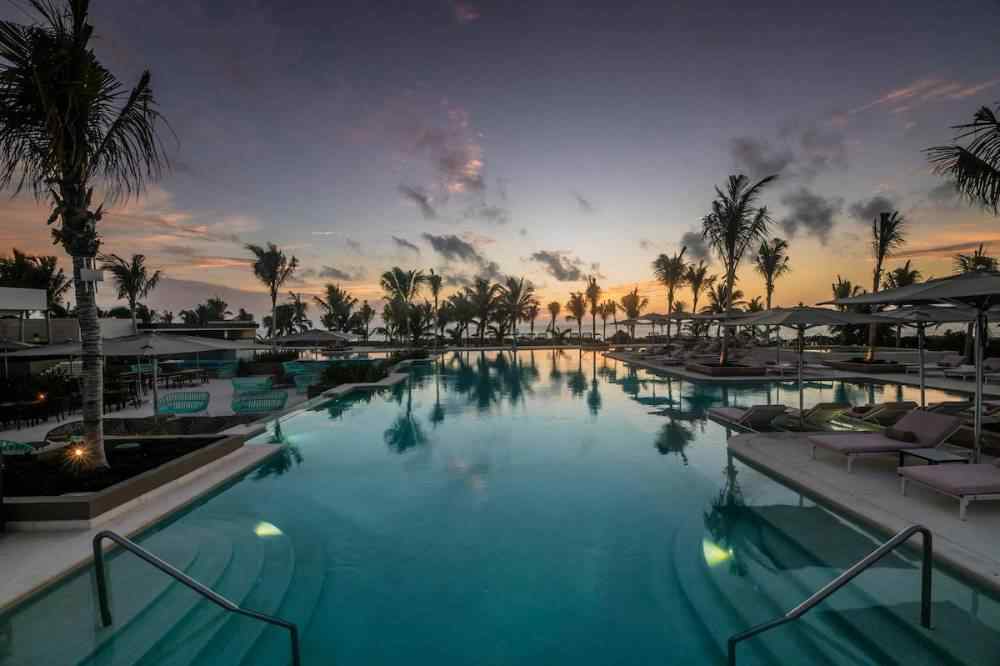 Main pool at Atelier Playa Mujeres at night