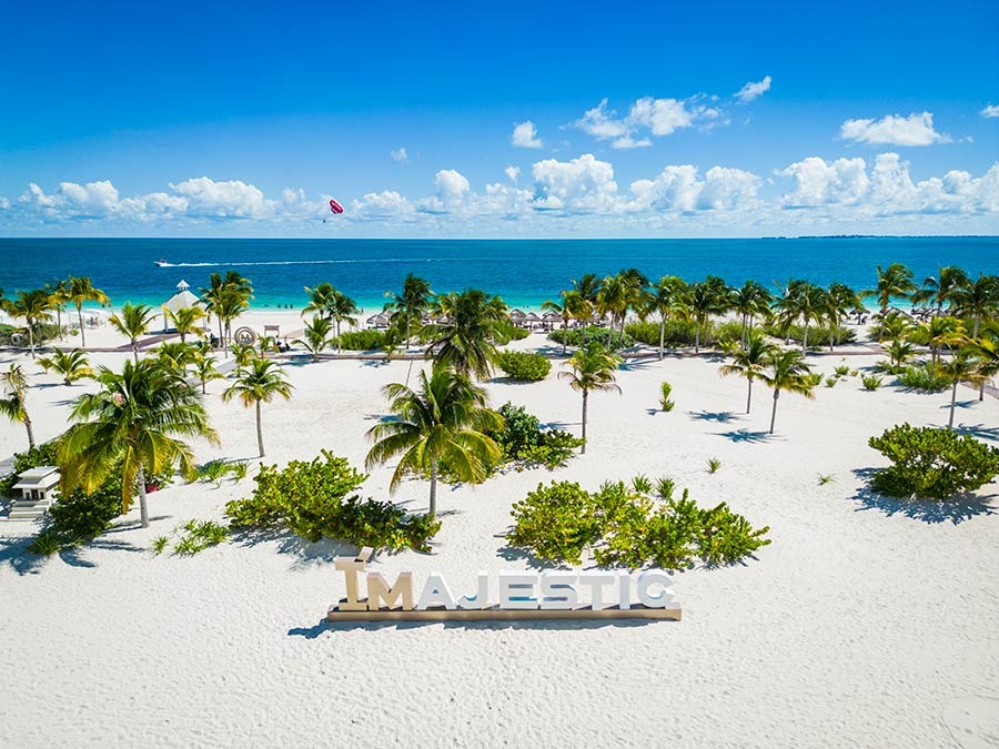 White sand beach and natural dunes at Majestic Elegance Costa Mujeres